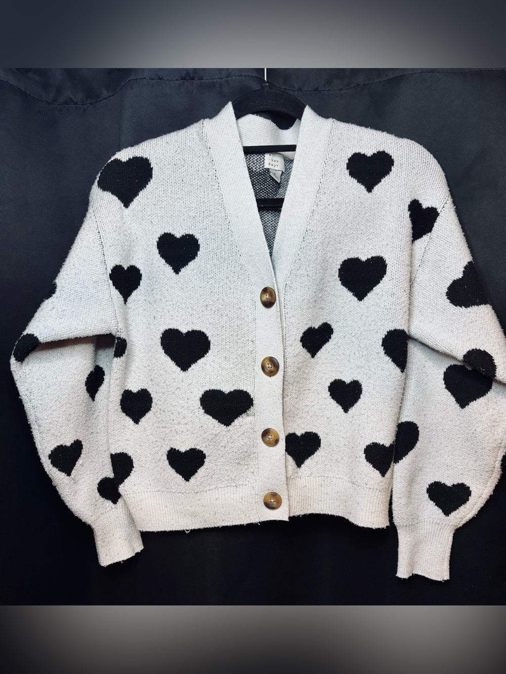 a new day Cream Cardigan with Black Heart Motif